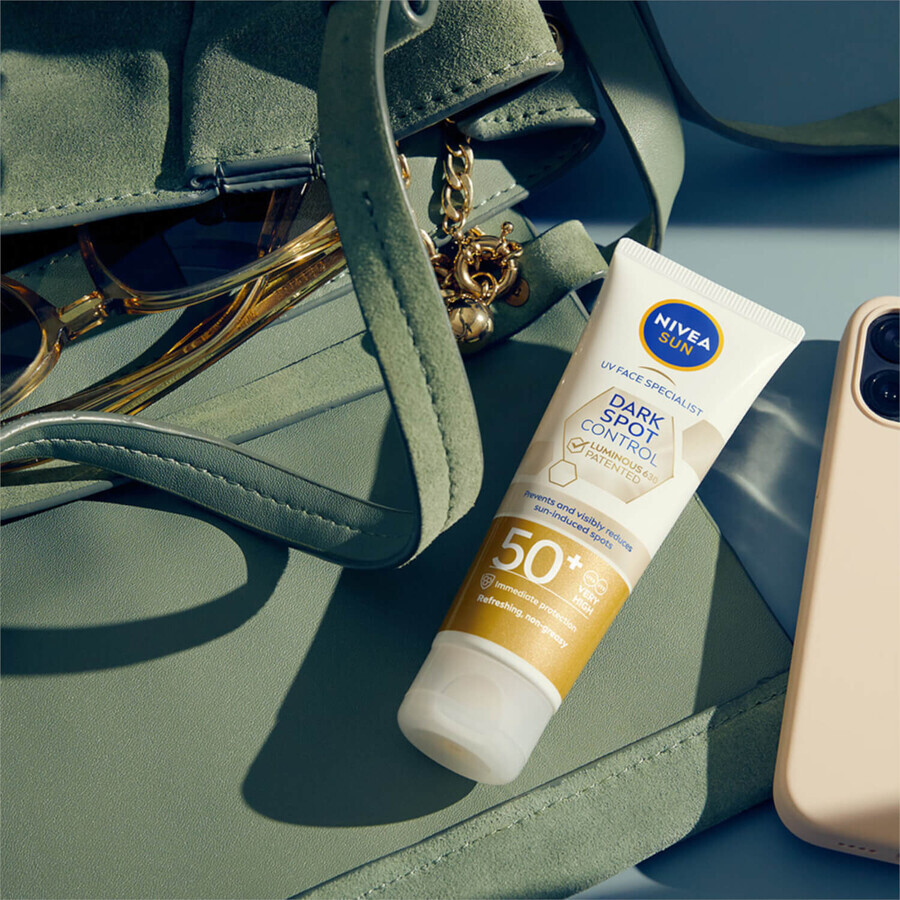 Set Nivea Sun Luminous 630, fluid facial cu protecție solară răcoritoare, SPF 50+, 50 ml + loțiune solară cu caroten, SPF 6, 200 ml + rucsac gratuit