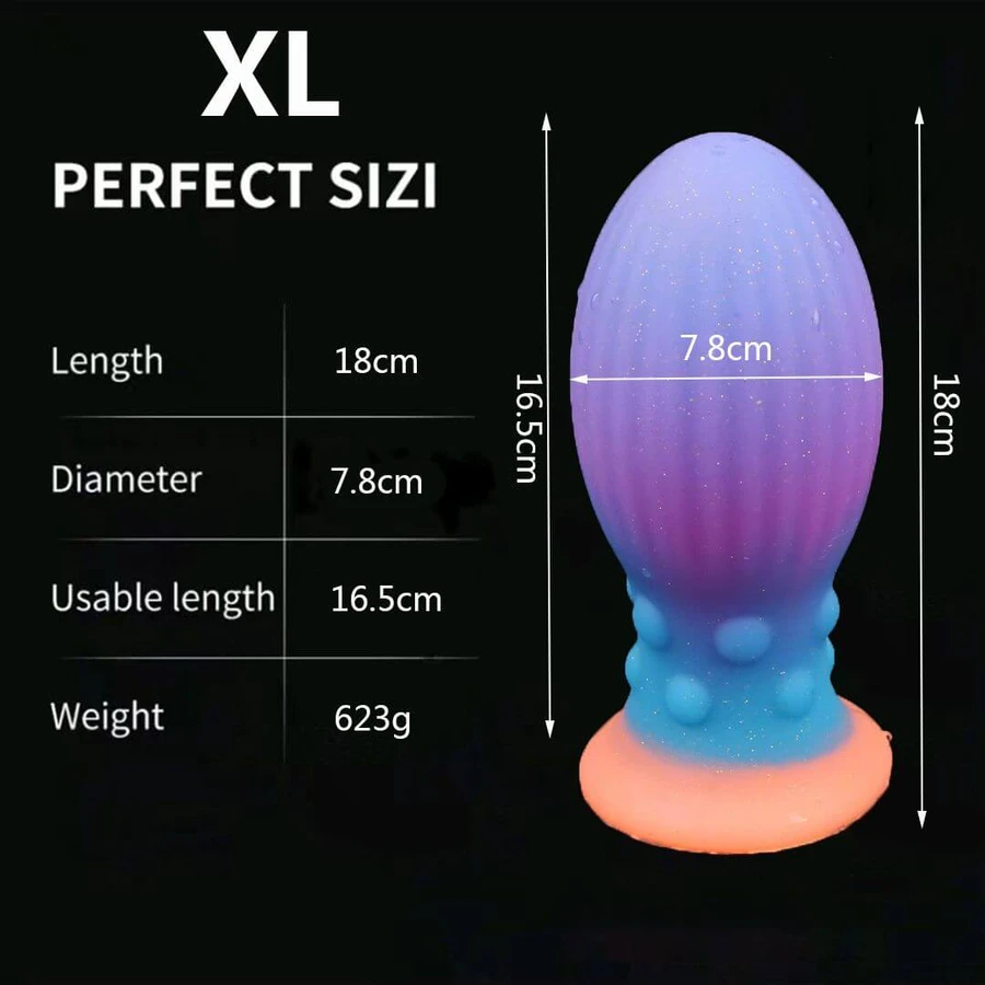 Świecący w ciemności silikonowy korek analny w kształcie jajka w rozmiarze XL z przyssawką, 18 x 7,8 cm – wielokolorowy: ceny i cechy
